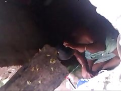 Indian bhabhi taking shower in open recorded by neighbor