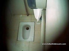Indian babe filmed naked in public toilet - indianhiddencams.com